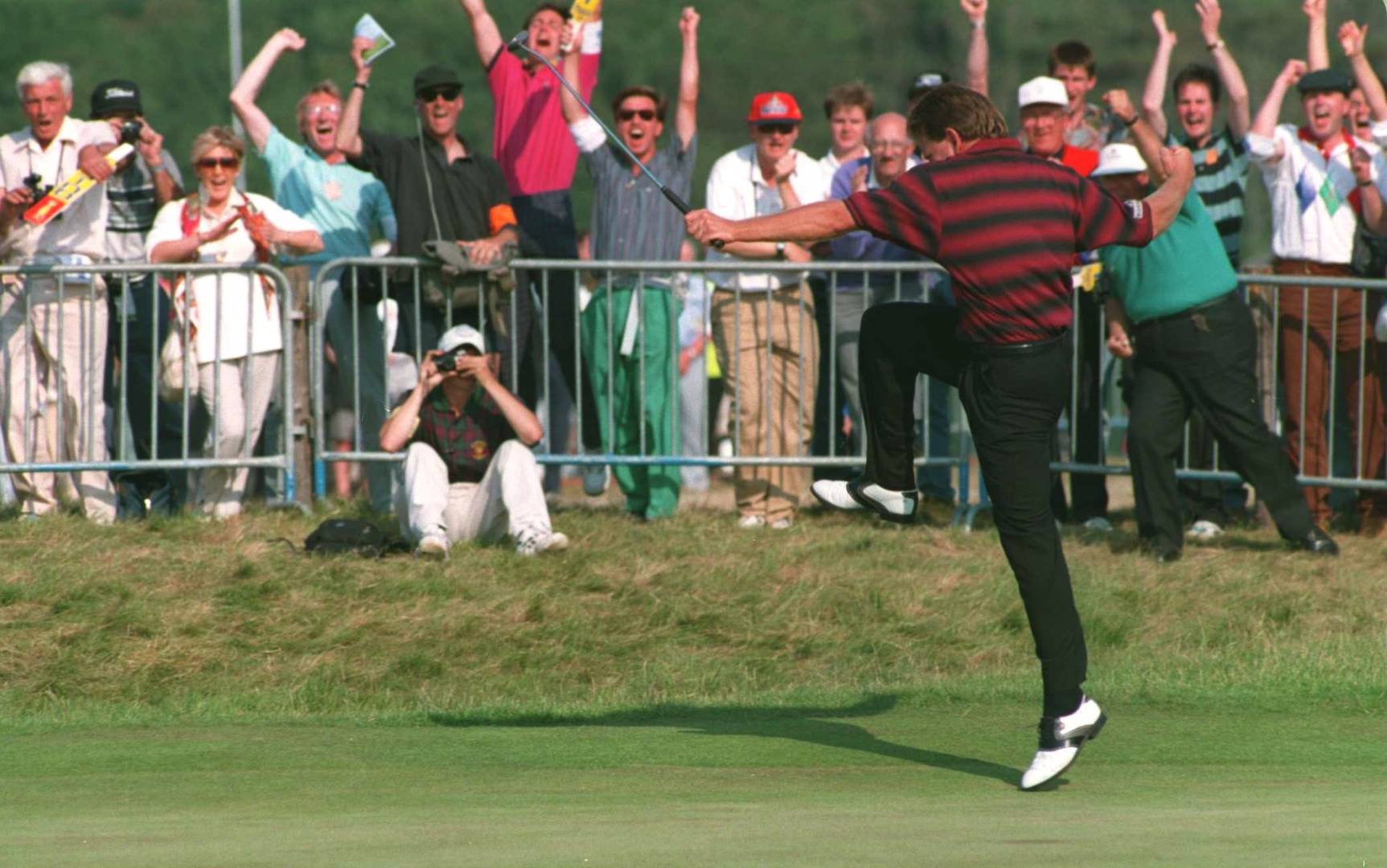 Nick Price jumps for joy after sinking an eagle putt on the 17th hole of the final round at Turnberry in 1994